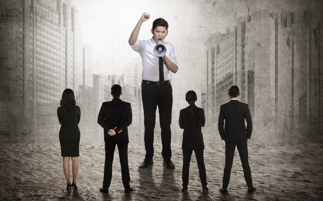 Business leader command his subordinate using megaphone