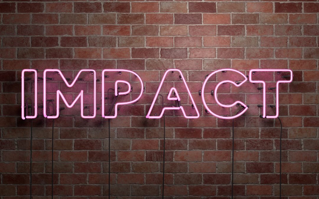 IMPACT - fluorescent Neon tube Sign on brickwork