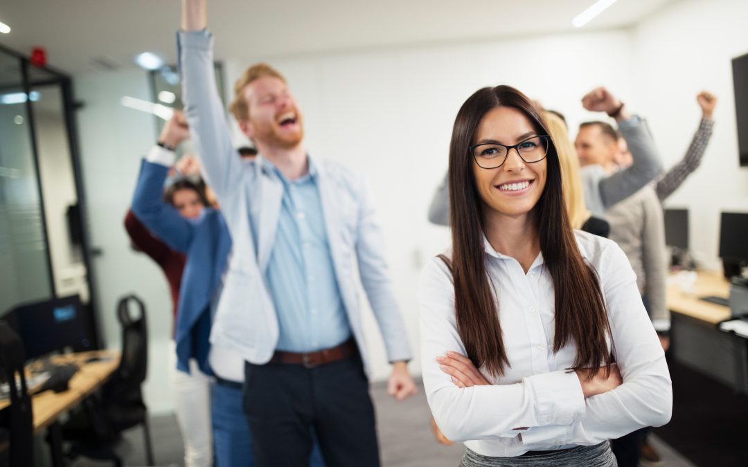 Business lady with positive look and cheerful smile posing for camera